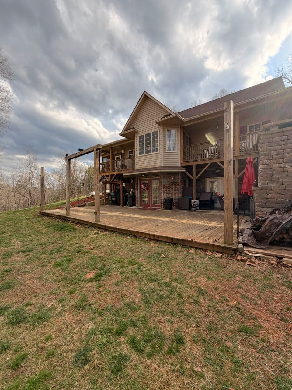 Ground-Level Deck Build Opens Up This Home's Backyard image