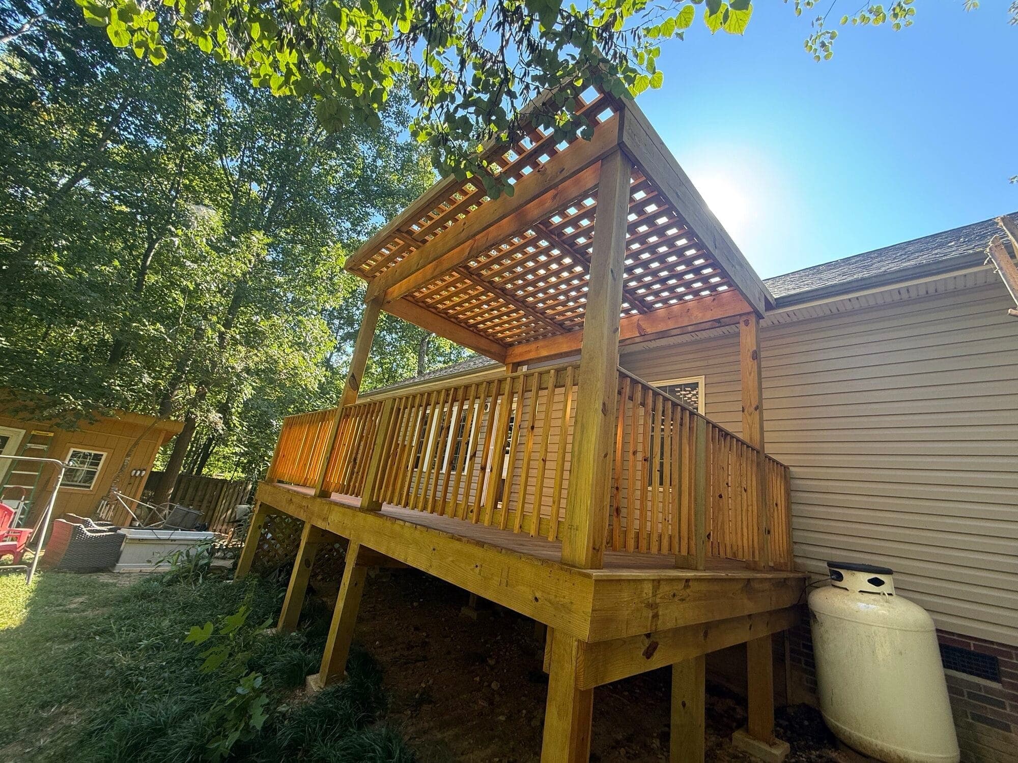 Multi-level custom deck with pergola and stairs built in Charlotte, NC