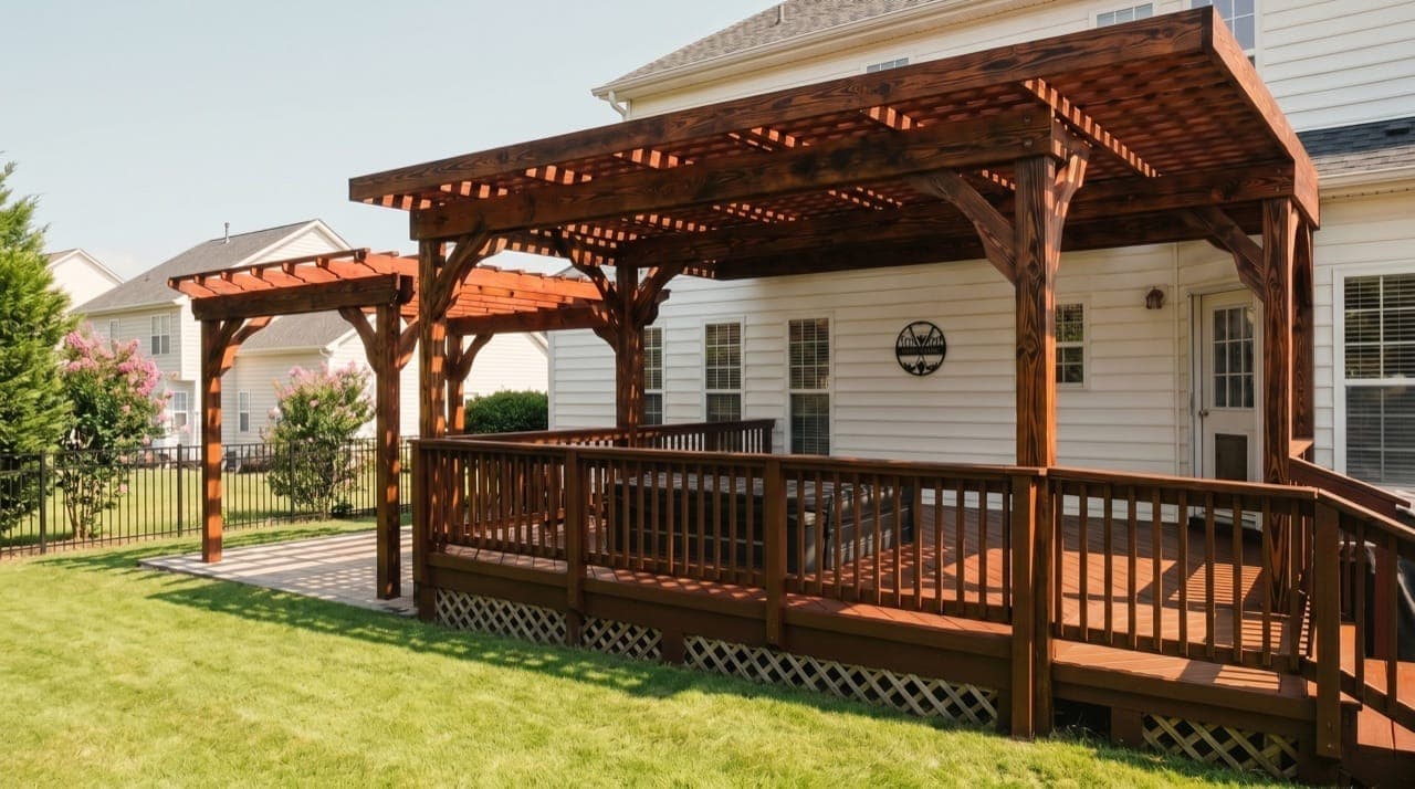Cedar pergola and covered porch built over a deck by Berg Custom Builds in the Charlotte metro